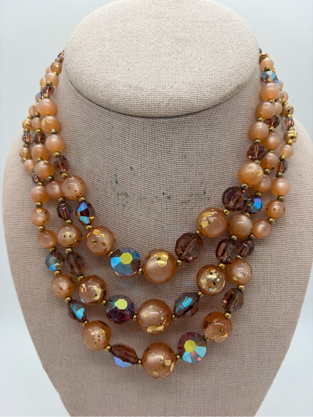 Vintage AB rhinestone and copper color plastic triple layer beaded necklace